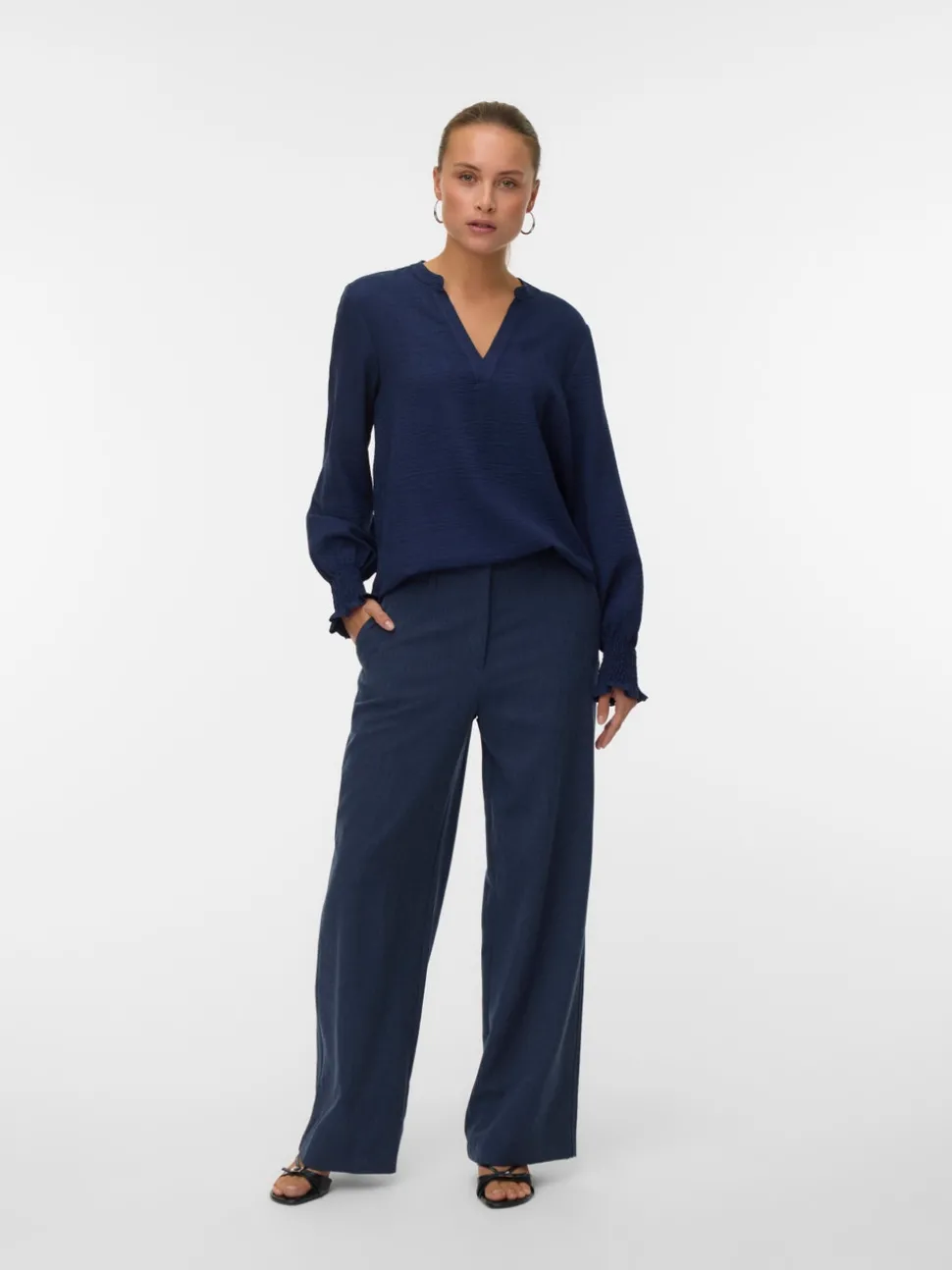 VMMELANEY Top
